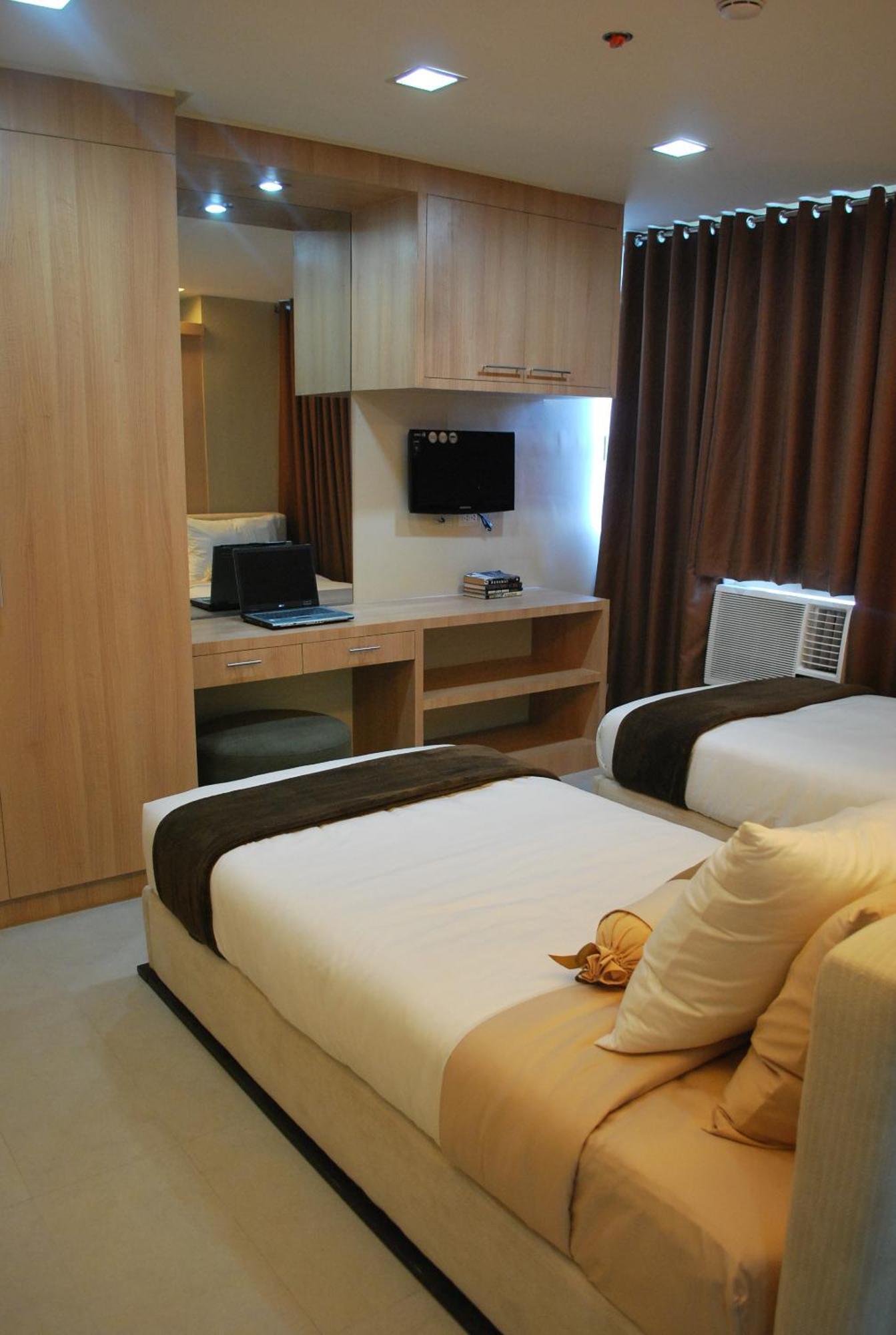 Bsa Twin Towers Aparthotel Mandaluyong Bagian luar foto